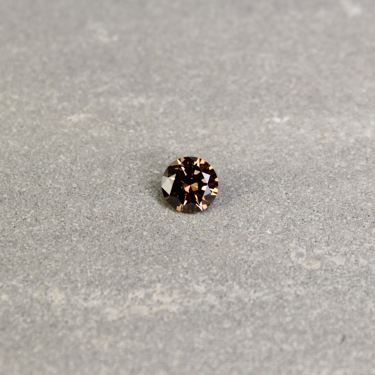 0.60ct Fancy Deep Brown, Round Diamond, SI1 - 5.54 - 5.59 x 3.23mm