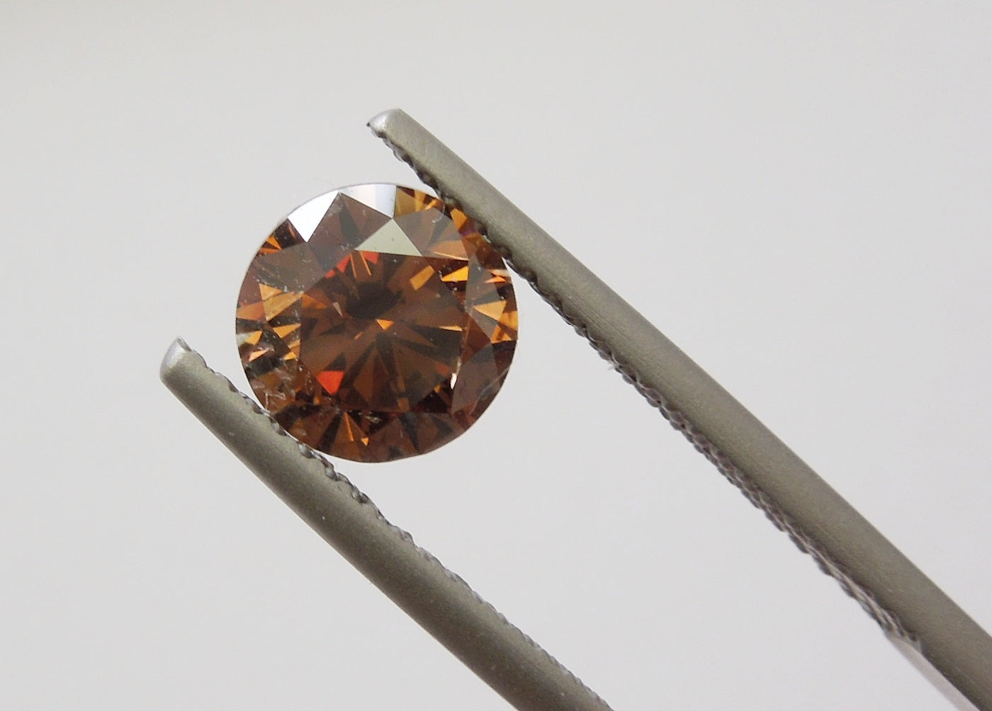 1.39ct Fancy Deep Orangy Brown, Round Diamond, SI1 - 6.92 - 7.00 x 4.48mm